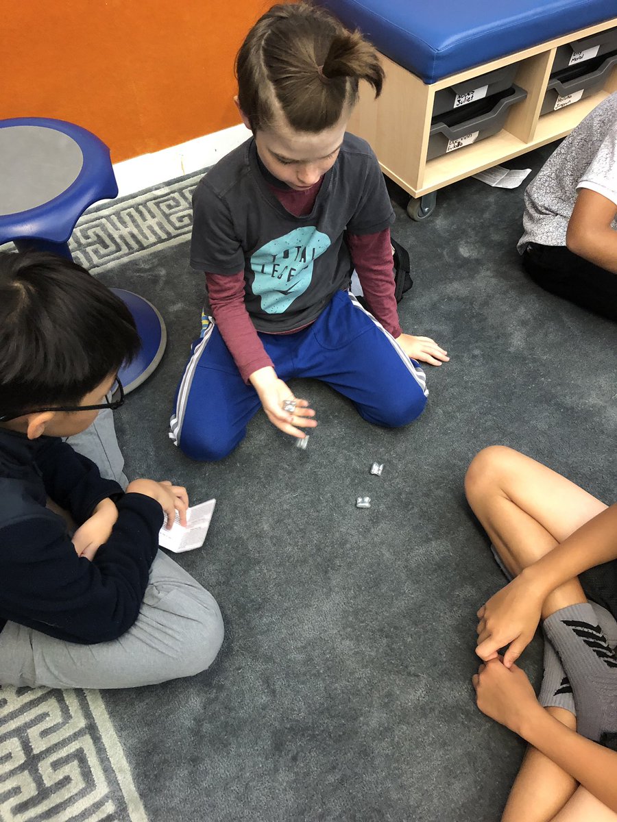 5B_atWork's tweet photo. Knucklebones: sharing games from other parts of the world. What skills are we learning? How might we apply these skills to learning? #games #positivelanguage #peerencouragement #fun #communitytime #UNIS_hanoi https://t.co/II9gqBMs6i
