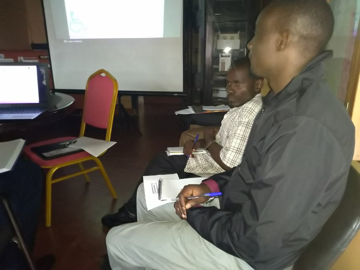 Accessibility Coalition members meeting for Building Strategic Alliance Advocacy Project at UNAPD Head office.