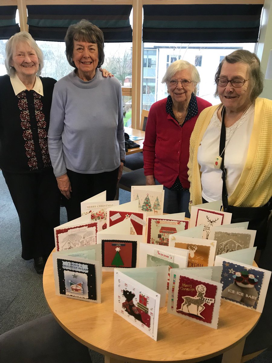 BrooksideEC's tweet image. Happy faces looking ing at all the fabulous Christmas cards.  These are made by the residents over the past few weeks. They are now signing them and sending to wish their families a merry Christmas 🎄
