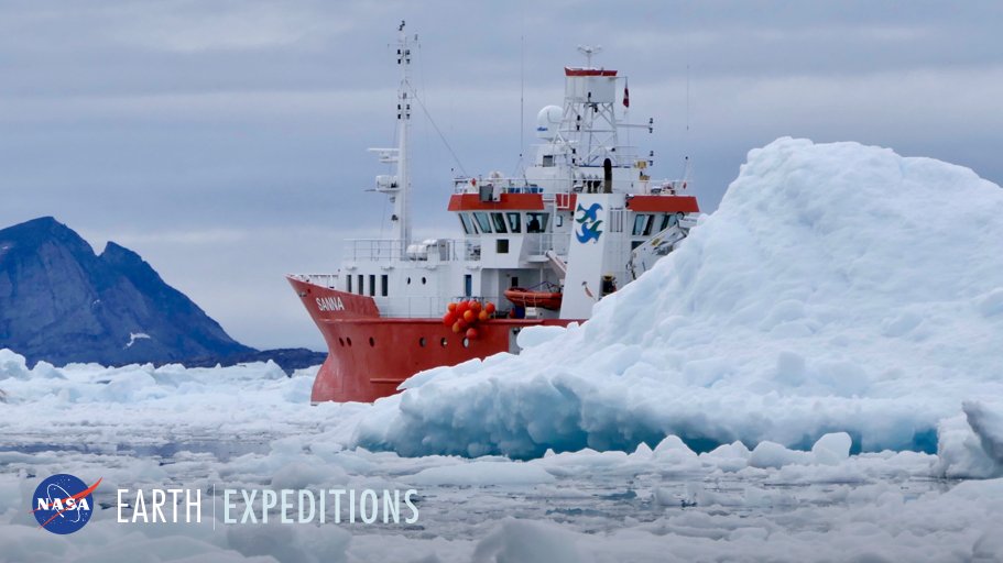 The ship Sanna peeking around an iceberg