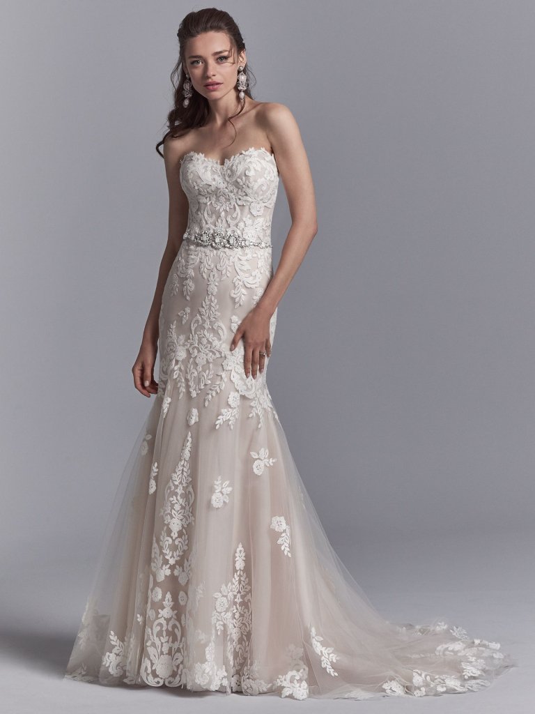 It is all about the details. We are in love with this Sottero&amp;Midgley beautifully beaded belt accented in Swarovski crystals, a strapless sweetheart neckline, and illusion scoop back with exposed boning accented in lace motifs. <a href="/maggiesottero/">Maggie Sottero Designs</a>