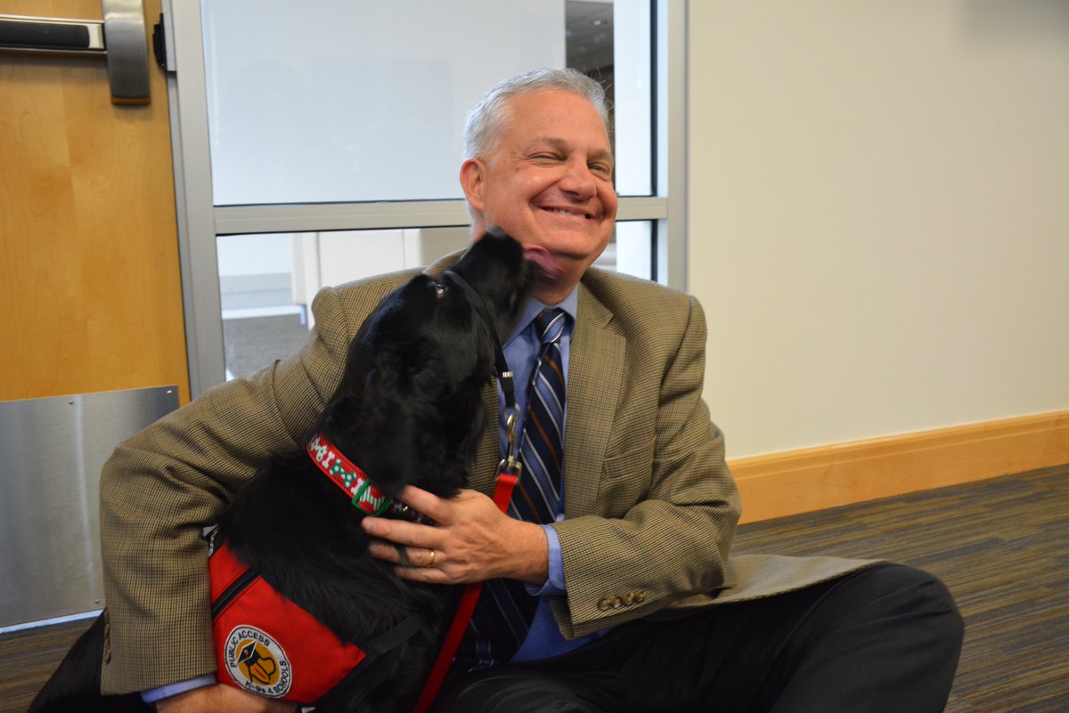 I'm here to bring you the news that matters, so here's Homewood's superintendent getting dog kisses.