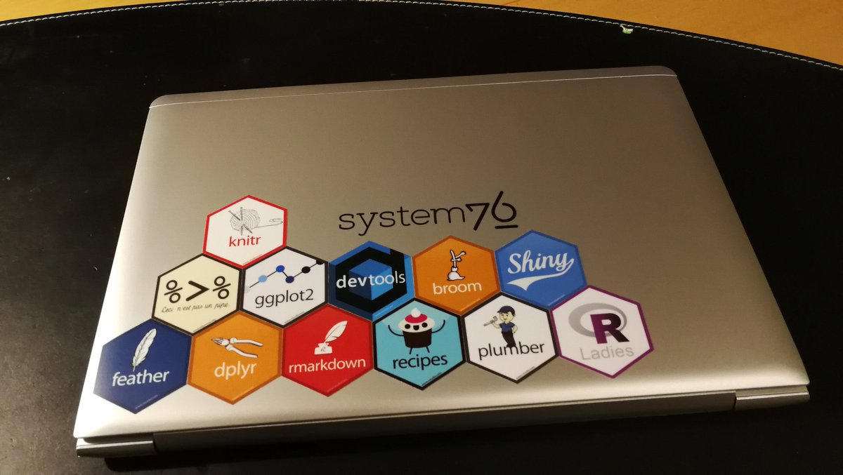 henningsway's tweet image. I've been saving #rstats stickers for a couple of months. Finally got a new laptop today. Looks good to me! :) #stickerwall