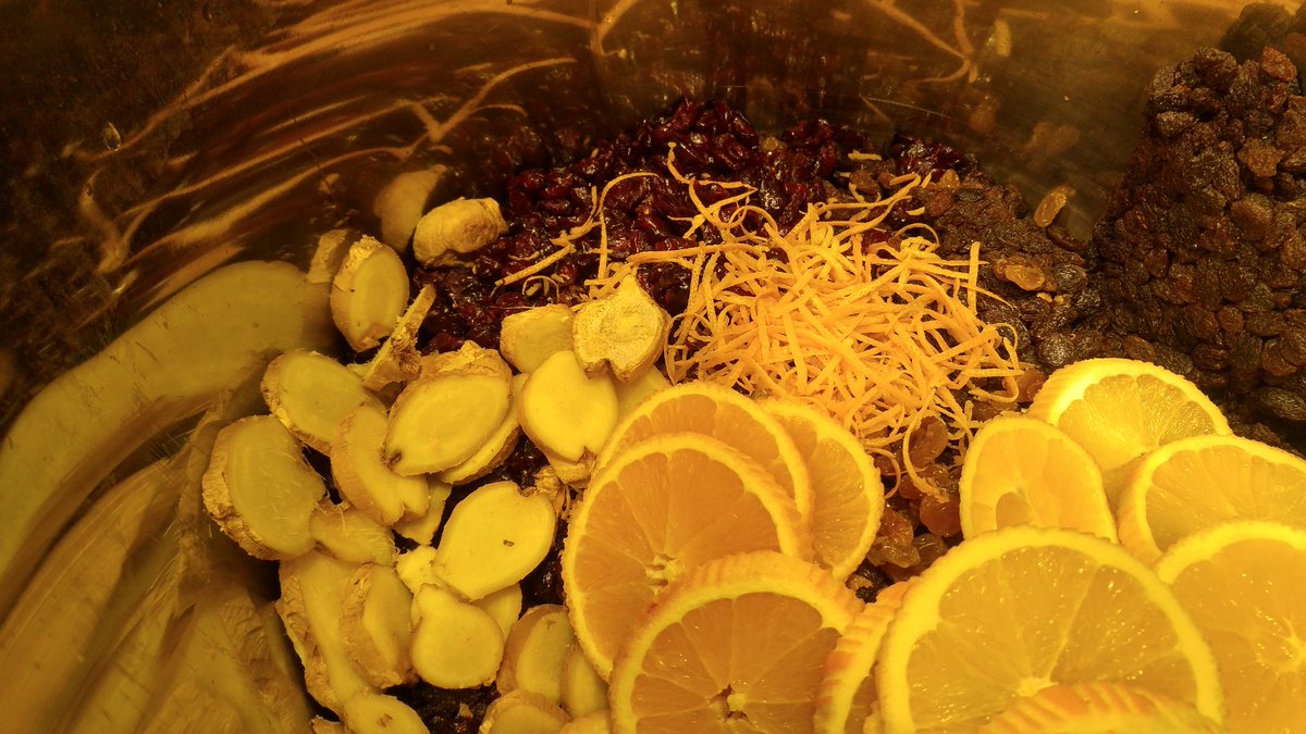 I start with everything in there: raisins (brown and golden), craisins, ginger, orange zest and orange slices, sugar and wine, and spices in a cheesecloth bag.