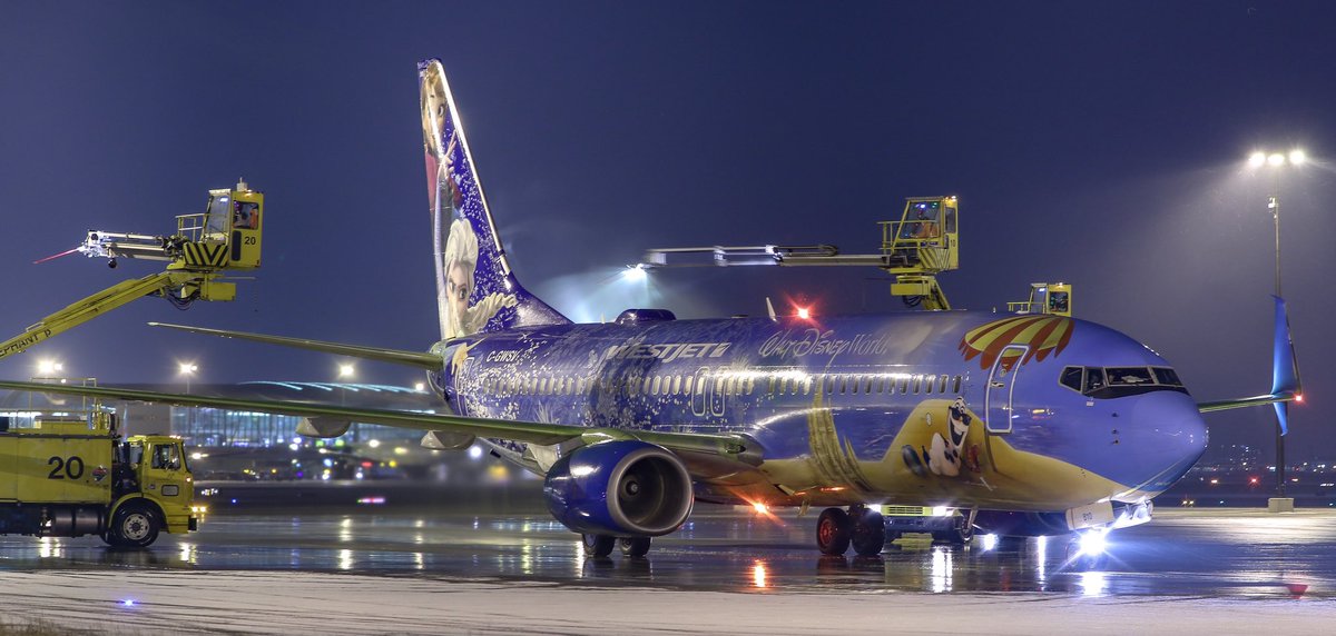 TomPodolec's tweet photo. Westjet Disney #FrozenPlane getting a quick spritz at Toronto’s Deicing Facility before it’s departure to Edmonton. #WS441 #deiceFrozen https://t.co/7ozzqJ5eSV