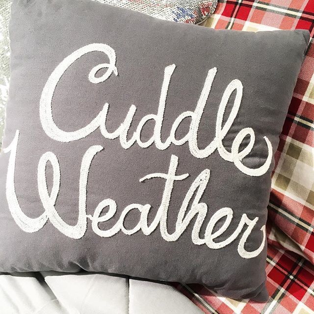 Throw pillow that says "Cuddle Weather."