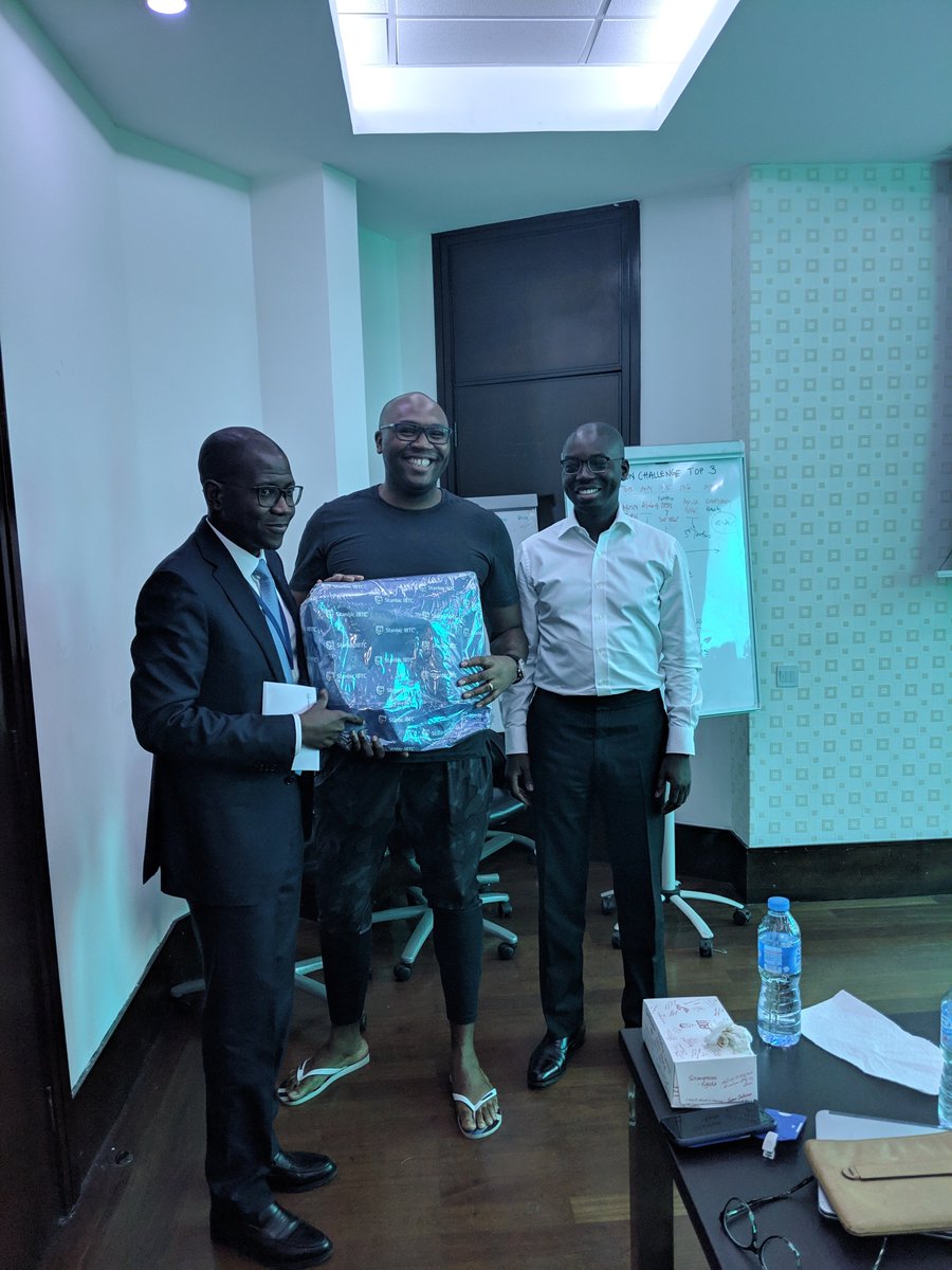JasonNjoku's tweet photo. It makes me a little sad in 2019 we are still debating dress codes in the tech community. This morning I gave the opening session for Stanbic IBTC Capital team on 'redefining the race'. 👇��me smiling with the Capital CEO Funso Akere and Stanbic IBTC Group CEO Yinka Sanni https://t.co/vxa9IgJUf3
