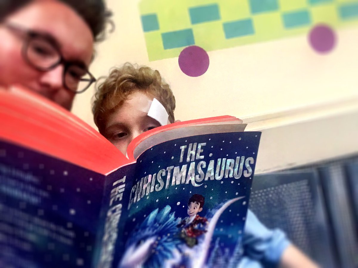 First day of leave and I am in A&E with my son 😞 luckily I had The Christmasaurus by @TomFletcher in my bag so the time is flying by 🦖🎄 Thank you to @NHSHomerton for the great treatment and help 👍