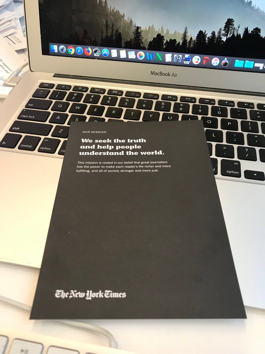 marclacey's tweet photo. The @nytimes mission on a card at every desk this morning. “This mission is rooted in our belief that great journalism has the power to make each reader’s life richer and more fulfilling, and all of society stronger and more just.” https://t.co/St8dDvaCst