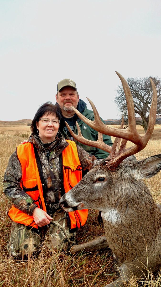 Our good friend Linda's South Dakota buck. Happy to hear that her Endeavor ED IV 10x42 binos and Endeavor RS 4-12x40D scope gave the assist! Wow! This buck is a 11 pt with a drop tine. Score is 161'