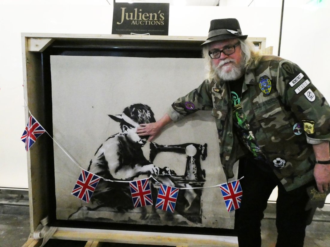 myartbroker's tweet photo. Incase you missed it last month, fellow street artist Ron English bought Banksy's 'Slave Labour' wall for £561,000 and plans to white-wash it as he is 'tired of people stealing our stuff off the streets and re-selling it' #banksy #ronenglish #streetart https://t.co/qhGJ6rw42V