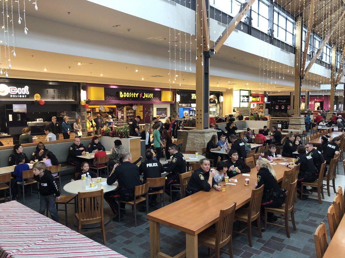 wpgpolice's tweet photo. These 60 students from various Winnipeg school divisions are ready to get their shop on with members of the Winnipeg Police Service during Cop Shop 2018 @StVitalCentre. #Winnipeg #CopShop2018 #CommunityParnerships #Kidsmatter #Holidayshopping https://t.co/FzA4halcD0