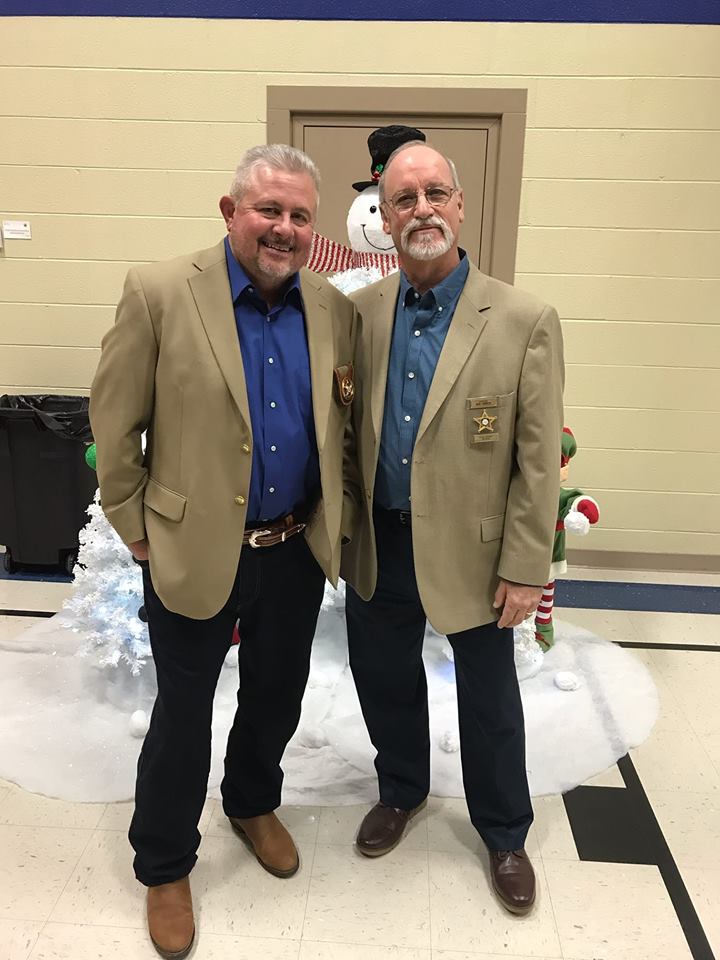 Sheriff Burkhalter and Chaplain Thornton twining at Georgia Sheriff's Youth Christmas Party. georgiasheriffsyouth.org