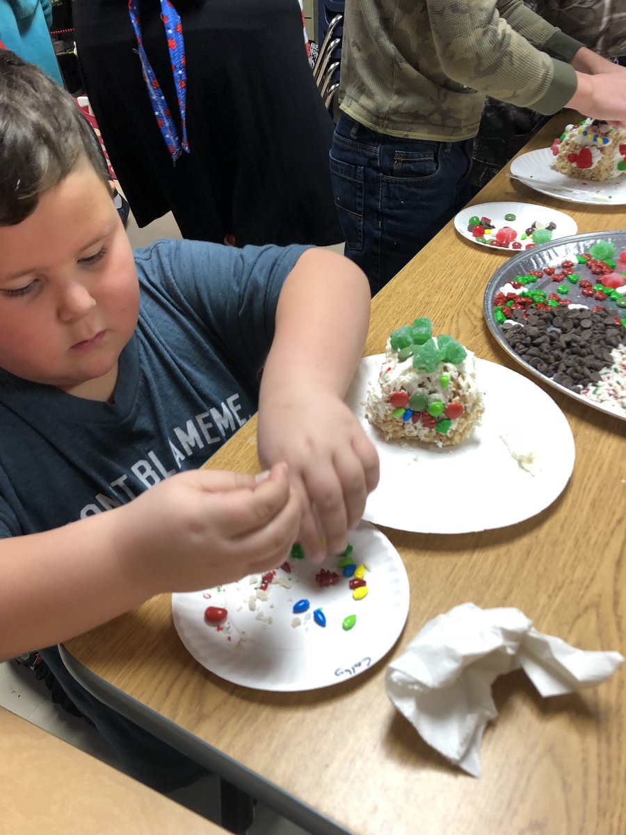 REMSJourneys's tweet photo. Happy National Gingerbread House Day! @Mrs_B_Room1 and their grade 6/7 buddies were hard at work constructing and decorating this morning. https://t.co/5lQCfKhget