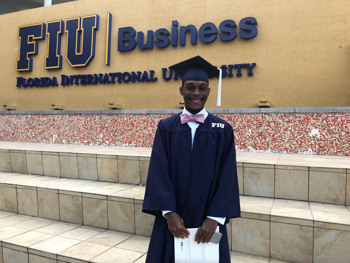 FIUBusiness's tweet photo. Before heading off to new horizons, one more photo in front of the sign. Congratulations #FIU18 - wishing you every success! #FIUgrad #FIUBizGrad #FIU https://t.co/pZ6haRSmpQ