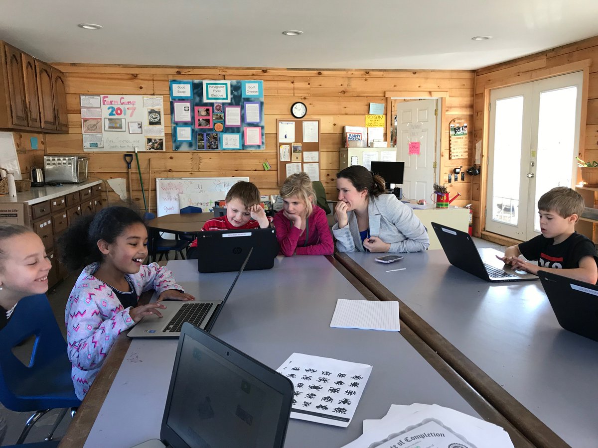 Grade 2 students excitedly playing Lightbot during the #HourOfCode last week in our campus Farm Headquarters.