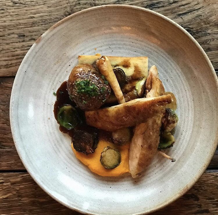 Roast guinea fowl, chestnut bread and butter pudding, carrot purée and roast parsnip. Red wine and log fire to complete Wednesday supper bliss at the #gardenkitchen