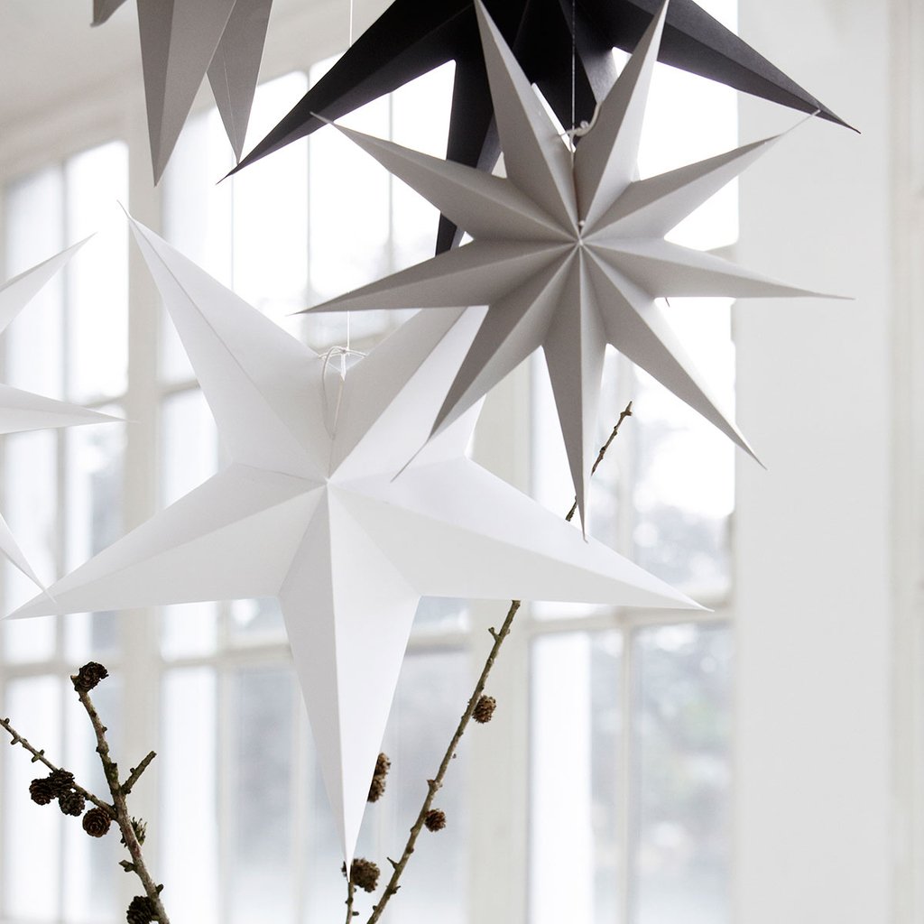 Often a festive scheme works better when kept simple. These striking paper stars are a stunning example of this! Keep it simple. 

We've a few of the grey stars left in store...

#simpledecor #festivedecorations #greystars #stars #paperstars #coolchristmas #hangingstars