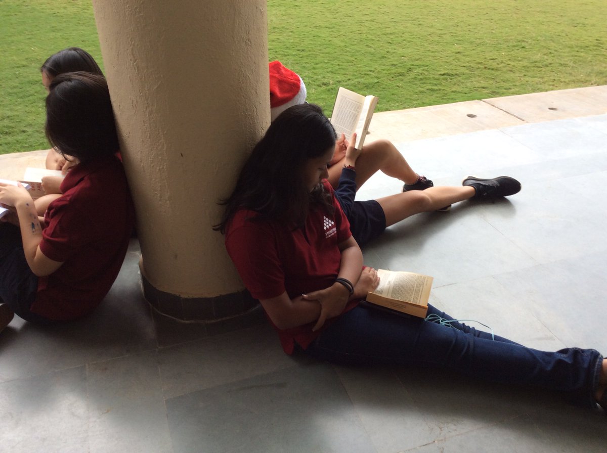 PremsonSaleth's tweet photo. Let's Read Together Initiative-
On Wednesday, secondary school M1- D2 met outside the library, sat on the beautiful lawns and delved into the world of books with complimentary cookies #SISlearns #Stonehill_SIS #SISreads https://t.co/Gx1M1AeM5w