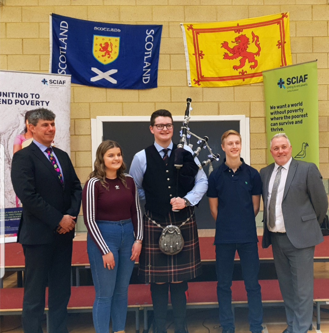KilsythAcademy's tweet photo. A special mention to our own Rebekah Machray, Mark Donnelly, Luke Shearer and Mr Russell on their incredible performances at our locality concert @St_Maurice_High in aid of @sciaf last night. #KA #KilsythAchieves #lookingforward #lookingforwardtogether https://t.co/Y4J0D55NLr