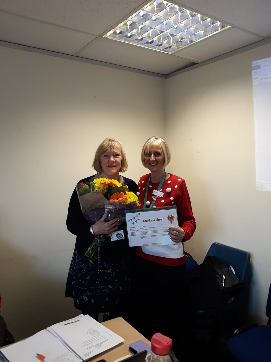 Jan Berry, School Nurse clinical team leader @Southern_NHSFT. receiving a much deserved 'Thanks a Bunch' presented by area manager Julie Hooper for all her hard work relocating the @easthantsSNteam & managing the day job at same time. Well done 👏💐