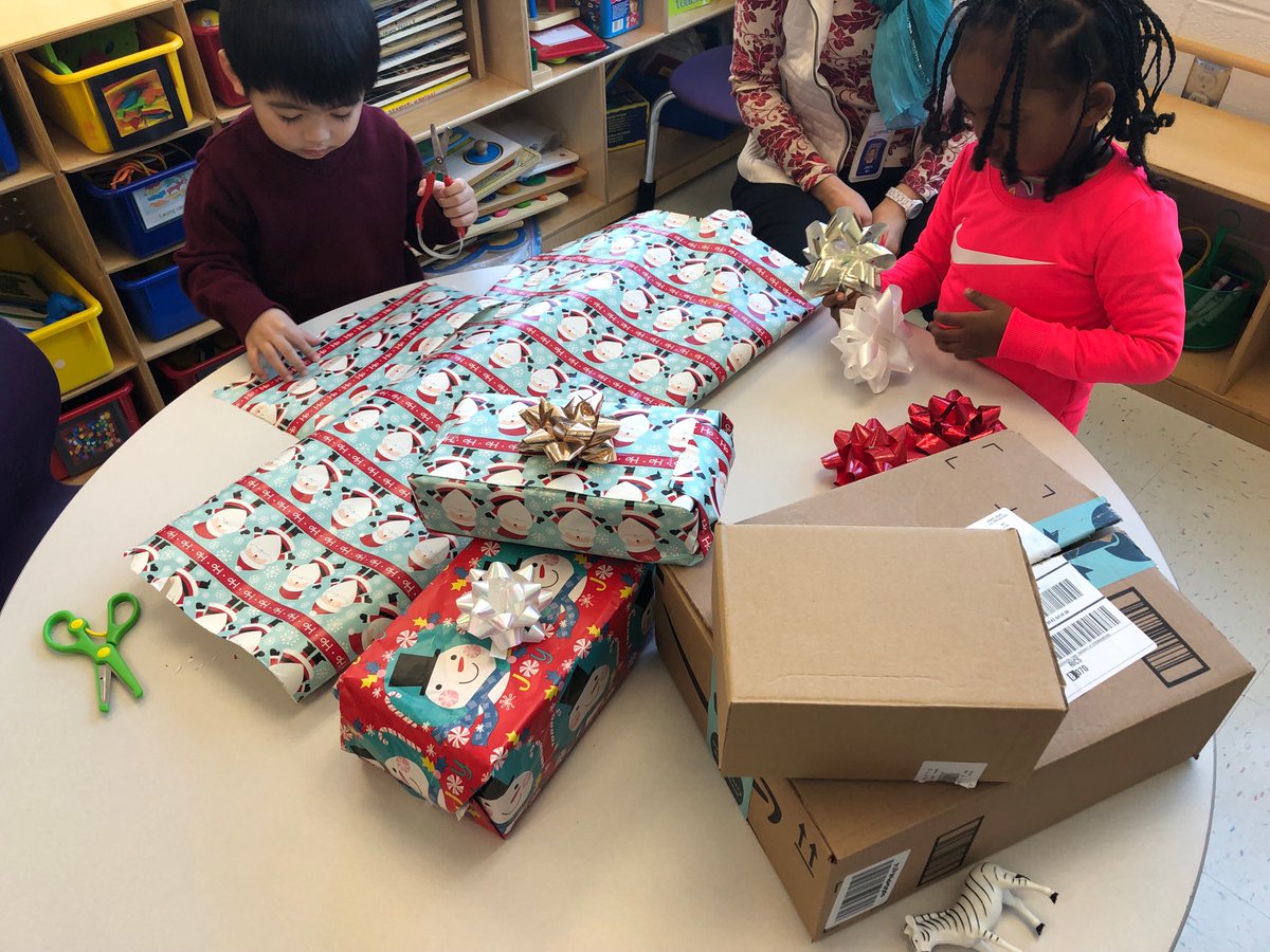 Wrapping presents in our writing station to build fine motor skills! Preschool is fun! ⁦<a href="/StratfordLndgES/">Stratford Landing ES</a>⁩