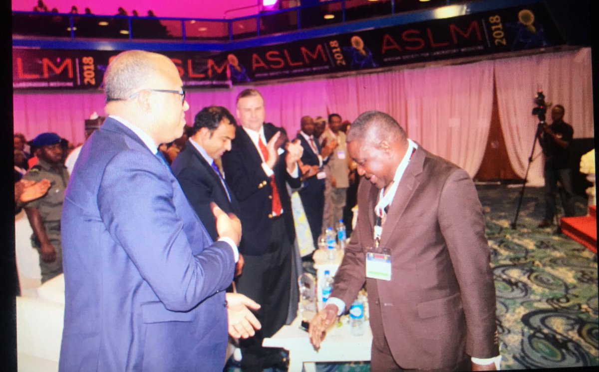 nighealthwatch's tweet photo. The African Society of Laboratory Medicine 4th International Conference wraps up on a high note with the Lifetime Achievement Award given to Professor Souleymane Mboup for his contributions to public health #ASLM2018 https://t.co/5dIDSyMICk