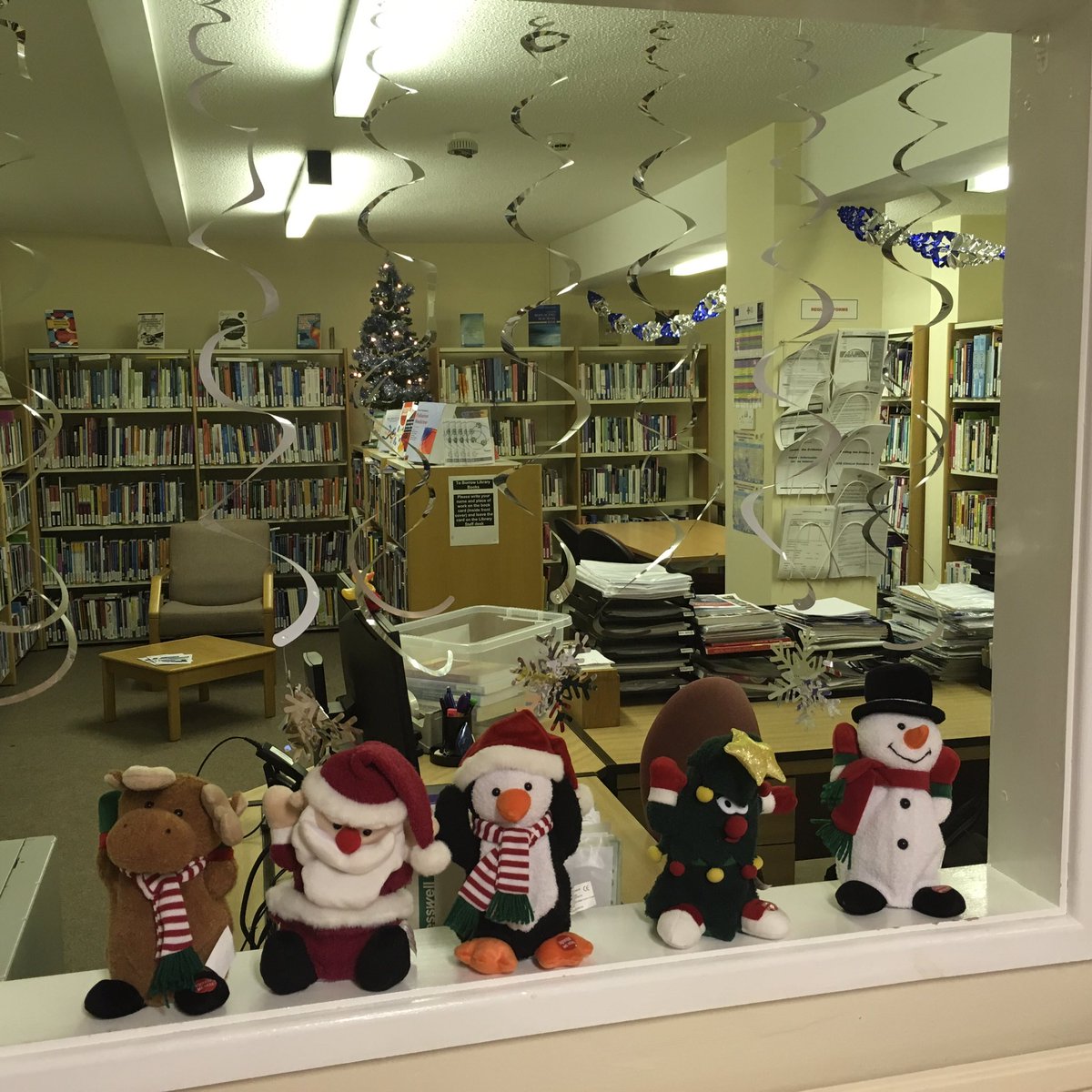 PowysTHBLibrary's tweet photo. The decs are up, Skelly’s got his festive outfit and the mince pies, and our resident choir is ready to sing their one hit wonder! #MerryChristmas from the library team at #PowysTHB https://t.co/uKjmxsAs1G