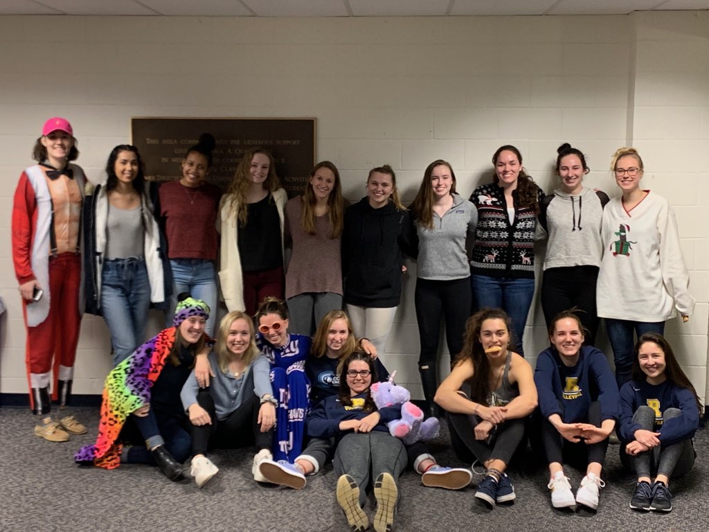 UR_Volleyball's tweet photo. URVB Non Denominational End of Season Holiday Extravaganza (and gift exchange)! The Santa onesie was a popular item! #URVB #meliora #whiteelephant #happyholidays https://t.co/q8F3F6Zpyo