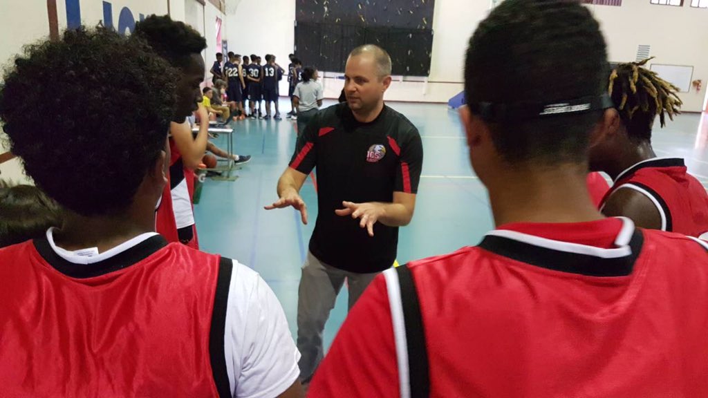 Coach chad is talking to his players about the practice and how they should remember all their plays. Coach chad thinks that games make them improve and makes them know what they are doing wrong. 
#icsaddis #ics
By:Yanet
