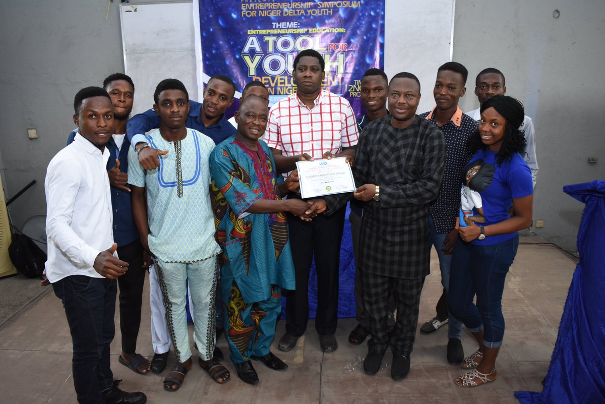 Presentation of award to the speaker ; Mr Sunny Rasaki by the HOD PEG pti and membership chair. Warri section 104