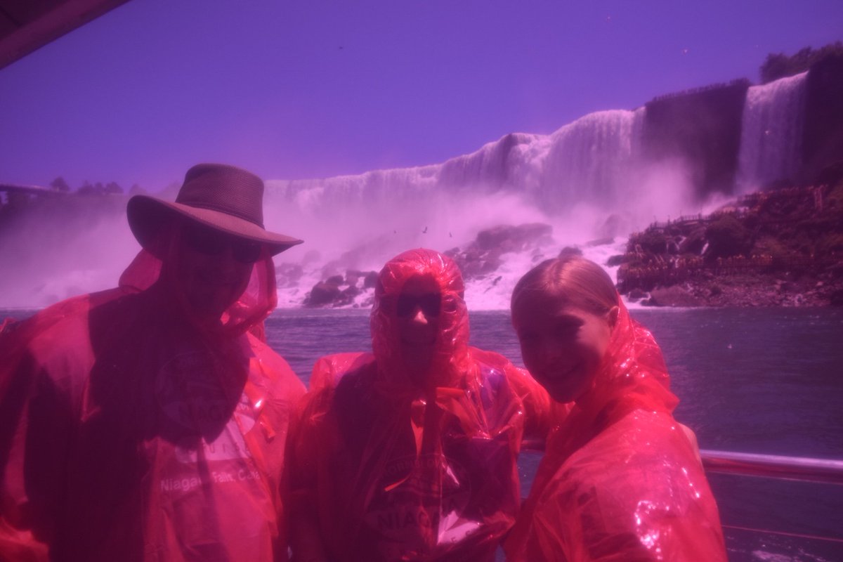 emily_rat's tweet photo. We went on a boat to see the falls and I didn’t want to get my camera wet so I shot through the poncho that they gave us and I actually liked how it turned out so here it is. Swipe to see my family in said ponchos 😂 https://t.co/RbiV3YDe4g