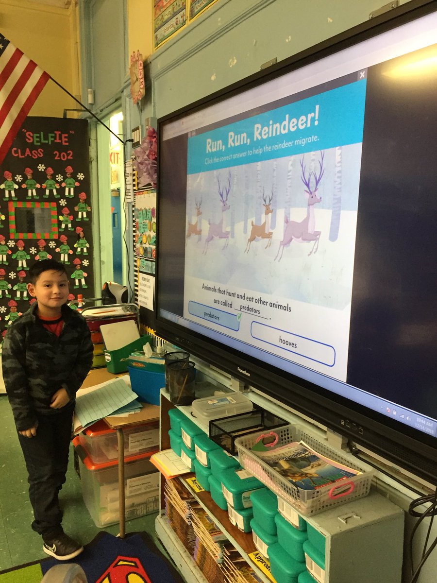 2ndGradeJKO's tweet image. We loved reading our @ScholasticNews magazine on reindeers today! @PS66JKO #scholasticnews #textevidence #readingforinformation #reindeer