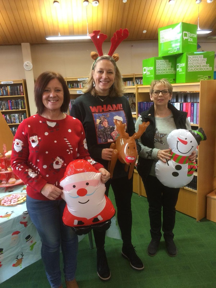 gateslibraries's tweet photo. It's #ChristmasJumperDay and the staff at #CrawcrookLibrary are putting on a fine festive show! https://t.co/K9U29ipZey