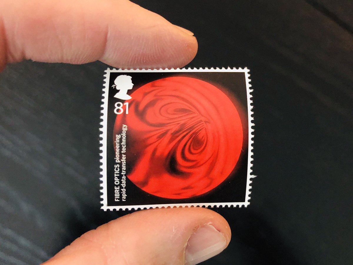 Like this one. At first glance, it’s obviously some celestial body, right? A space stamp, which, cool! But no, it’s actually a cross section of a fiber optic stream. This is a stamp that celebrates using light to transmit information. 