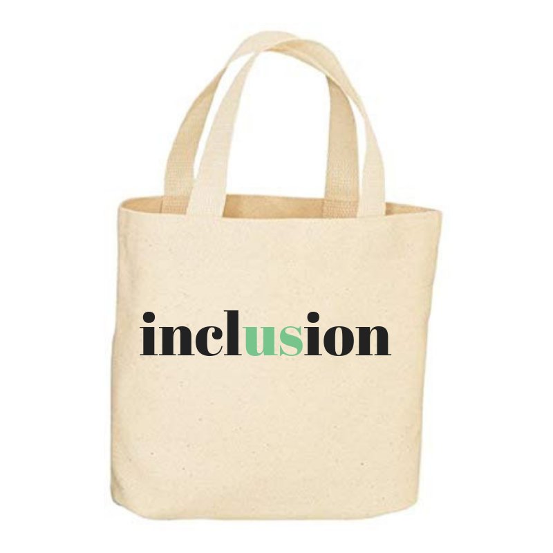 Tote bag with the word "inclusion" on it.