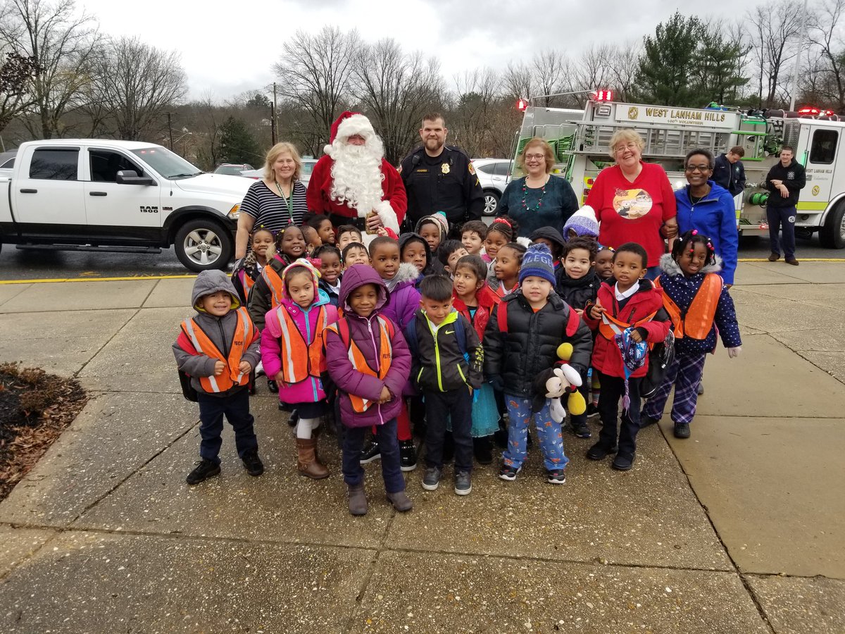 Thank you, Chief Rice and Officer Hughes, for arranging Santa's visit to Carrollton today! The students were soooooo excited!!
