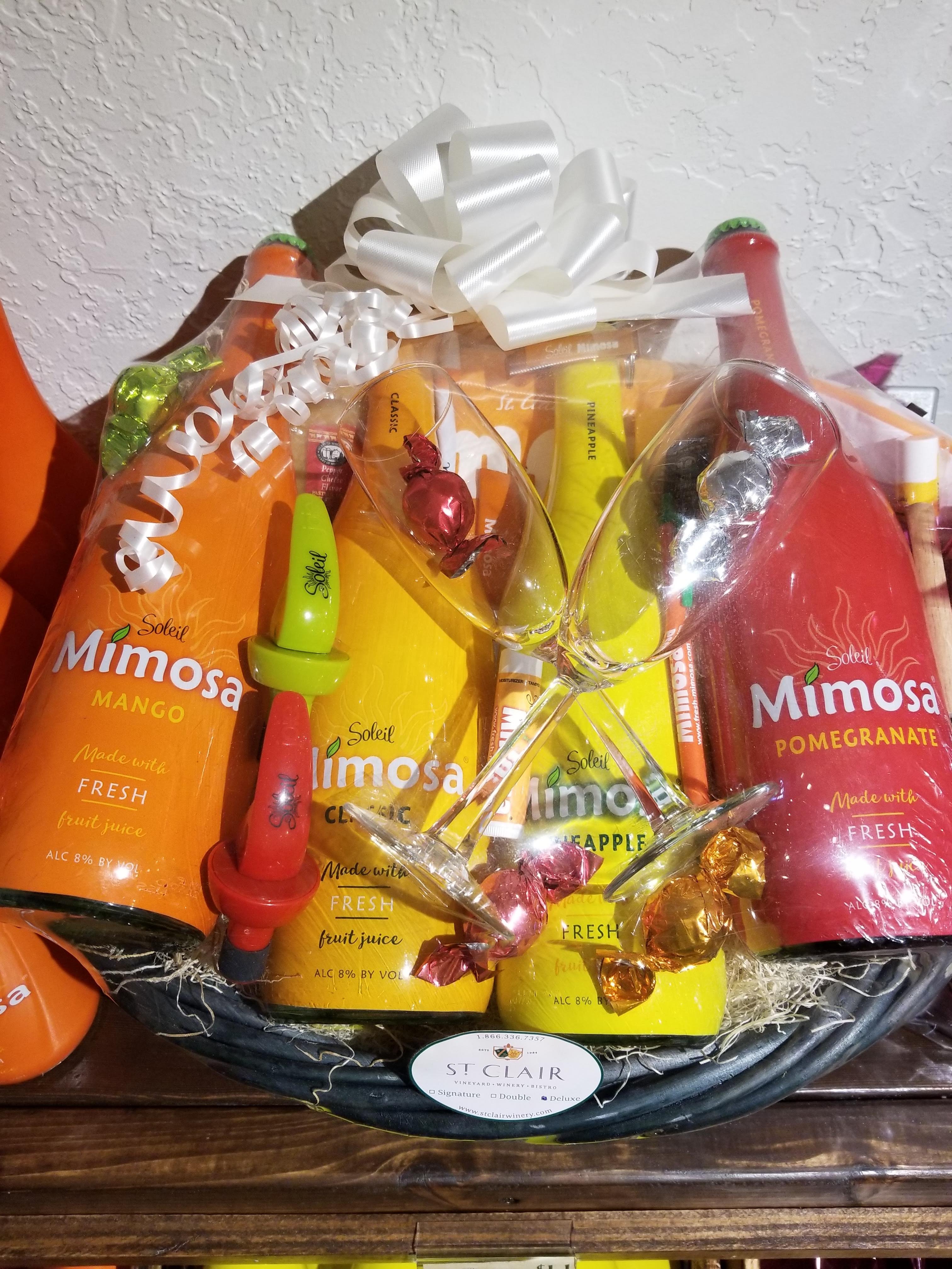 Soleil Mimosa on X: Brighten up someone's holiday with a Mimosa gift  basket. Choose a single, double or deluxe bottle gift basket.   #ChristmasGift  / X