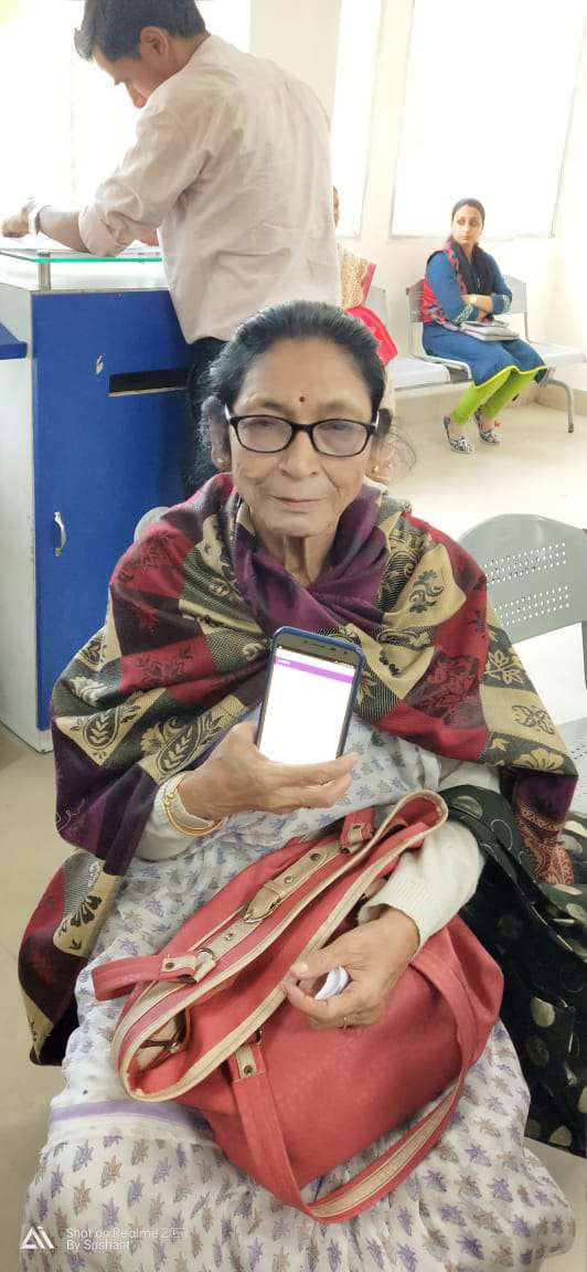 Banking on YONO She bought new phone as her older phone was not supporting YONO app... now she need not visit branch for routine banking... She was eager to learn YONO and its features..!