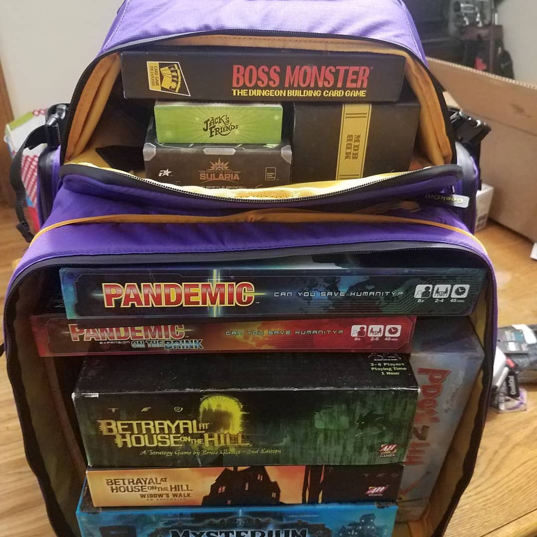 Dads_Attic's tweet photo. So we backed this kickstarter project several months ago and it finally arrived! It's the boardgame backpack by Geekon! I was able to fit 12 games snuggly. I could have easily fit a few more but I didn't want to cram them and damage the boxes. #gamenight #boardgamegeek #geekon! https://t.co/cbBdzoDoQS
