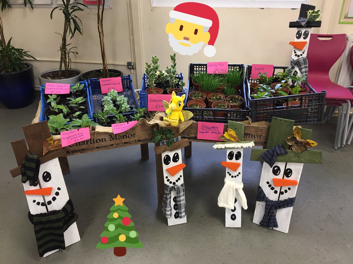 Nibbles LOVES Christmas AND these snowmen decorations and plants at <a href="/charltonmanor/">Charlton Manor Sch</a> ! Come in today to get your own!