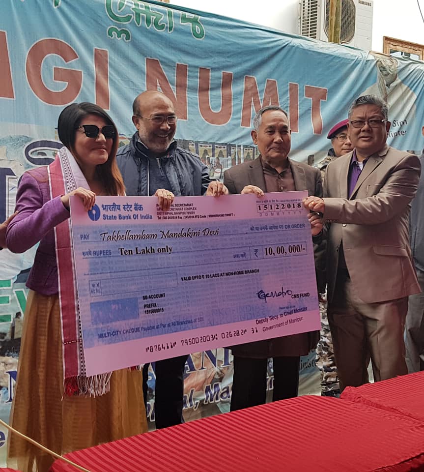 BJP4Manipur's tweet photo. A Promise made and the promise delivered- that how HCM, @NBirenSingh works in Manipur. Singer Mandikini of Manipur was felicitated with a cash award of rupees ten lakhs on #MeeyamgiNumit & #HillLeadersDay held today
#PromiseMadeAndPromiseKept
@BJP4Manipur @Bhabananda_bjp https://t.co/L3X0etTgRt