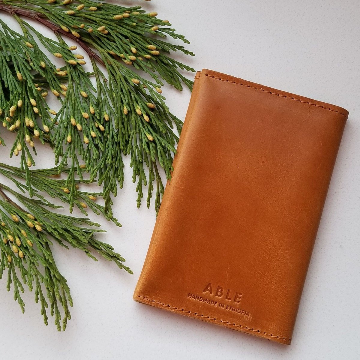 akindboutique's tweet photo. The Eyerusalem Passport Wallet is handcrafted with LOVE in Ethiopia by people who are making a living wage for their families! 

FREE SHIPPING through 12.15.18 with code HOLIDAYSHIP

https://t.co/JSb9jLLEik https://t.co/L2DUkgtzre