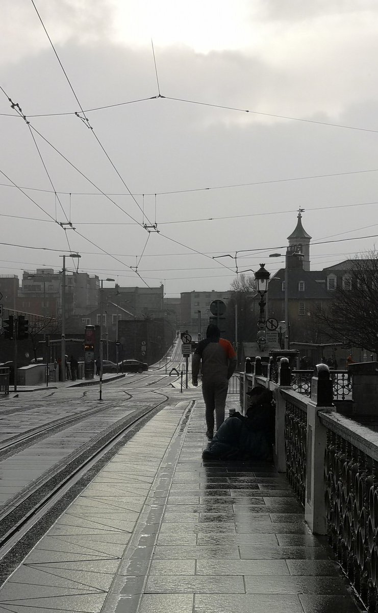 TaraMorganMedia's tweet photo. Something has to change!!!
This poor man sitting outside Heuston Station now and getting fucking soaked 😢😠 https://t.co/yXkT68qSDo