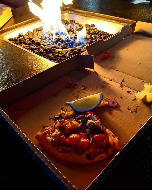 BaseCampPizza's tweet photo. We love that cozy-up-by-the-fire weather, but we love it even more with a Thai Chicken Curry pizza. || Order Online: https://t.co/tELlkwTlJ6 || Photo: https://t.co/MsH8w4cqy7 https://t.co/YknV9OJ3Xc