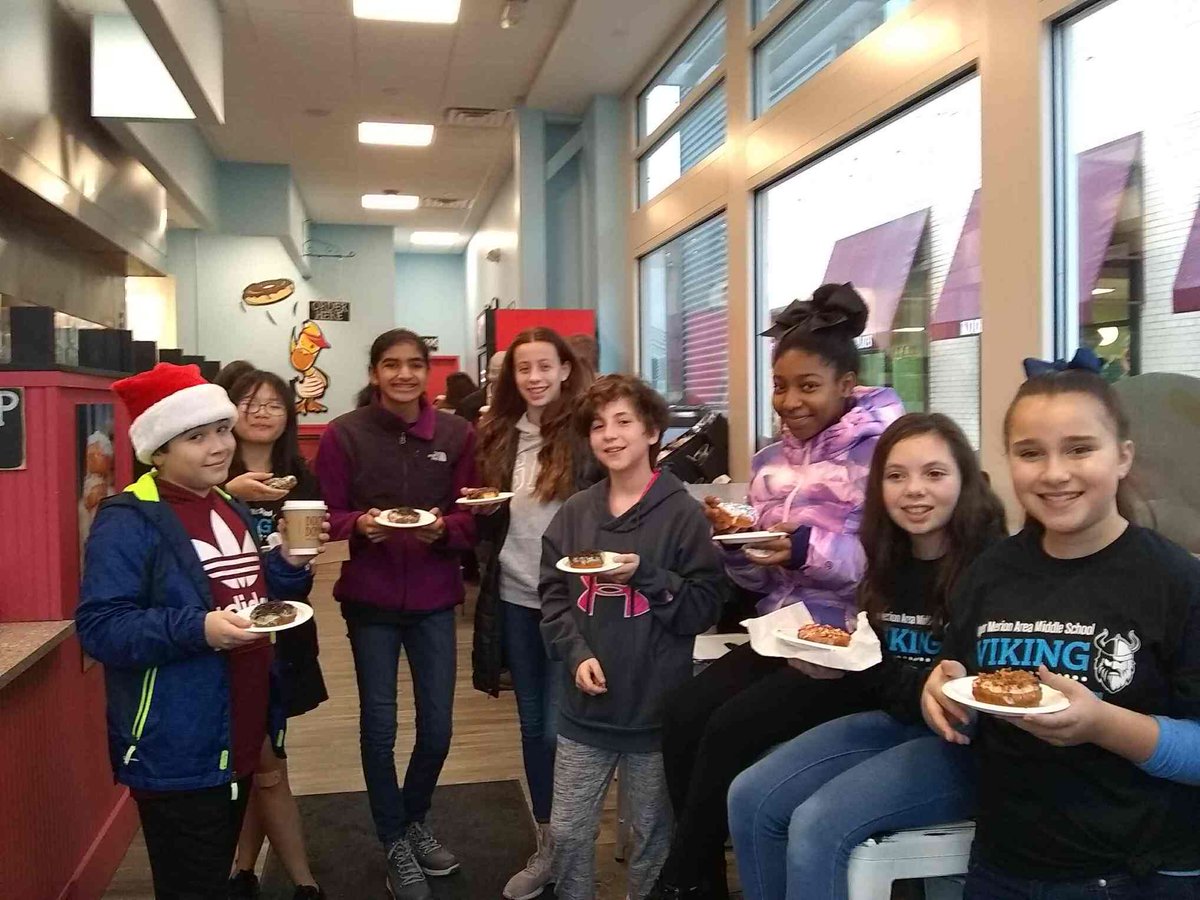 Bell Ensemble playing at the King of Prussia Town Center Winterfest and enjoying some post-performance Duck Donuts!