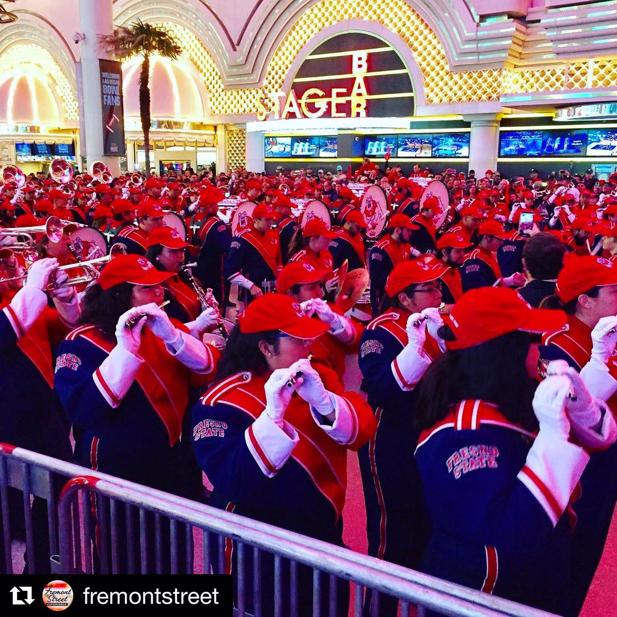 GoldenNuggetLV's tweet photo. Great shot of the #LasVegasBowl pep rally last night! Who’s watching the game?! Photo Credit: @FSELV #Bar46 #dtlv #FremontSt #GoldenNuggetLV https://t.co/u4OSQhbMxE