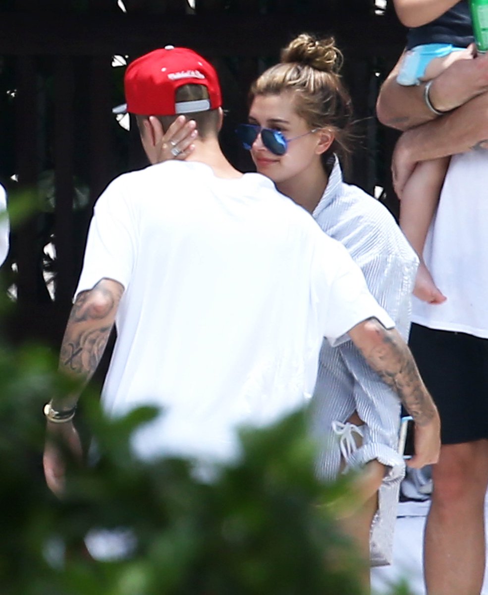 June 15, 2015: Hailey and Justin at a poolside in Miami.