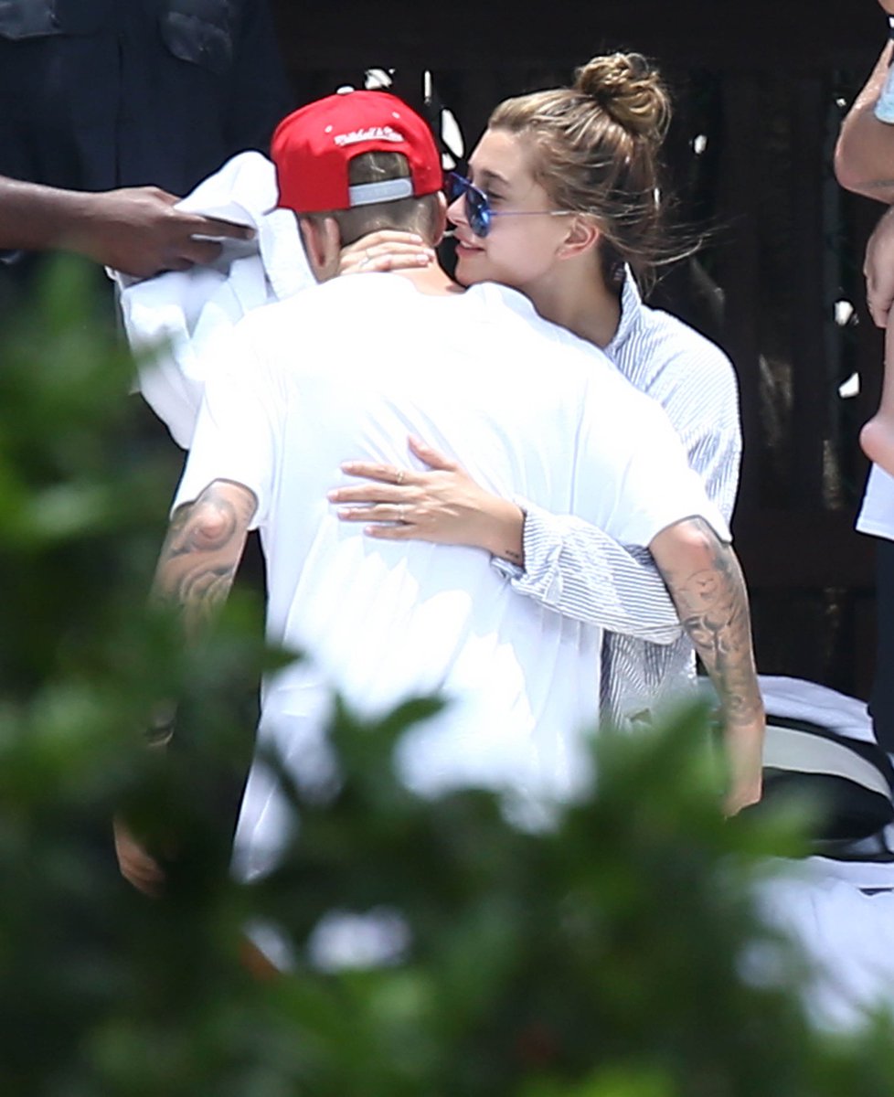 June 15, 2015: Hailey and Justin at a poolside in Miami.