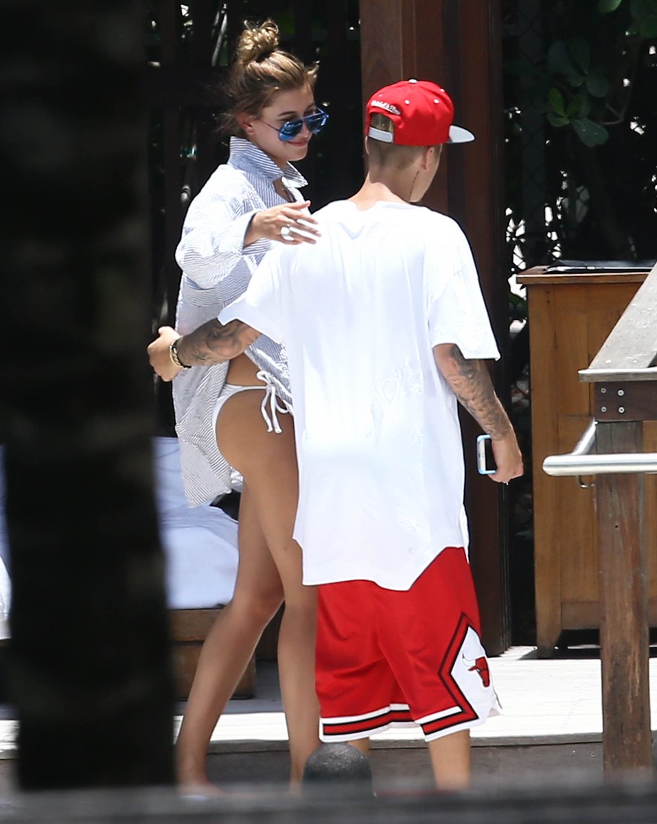 June 15, 2015: Hailey and Justin at a poolside in Miami.